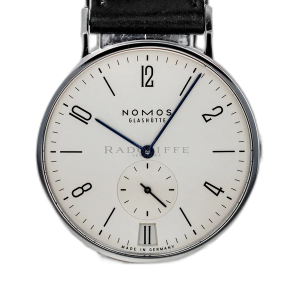 NOMOS Tangente 38 Date | Gentlemen Prestige Watch Review NOMOS Tangente 38 Date luxury watch - premium timepiece with specifications and market price for gentlemen collectors